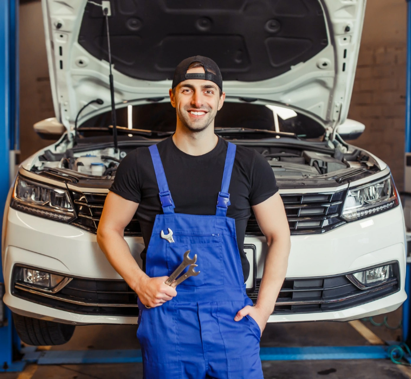 Mechanic in blue overalls
